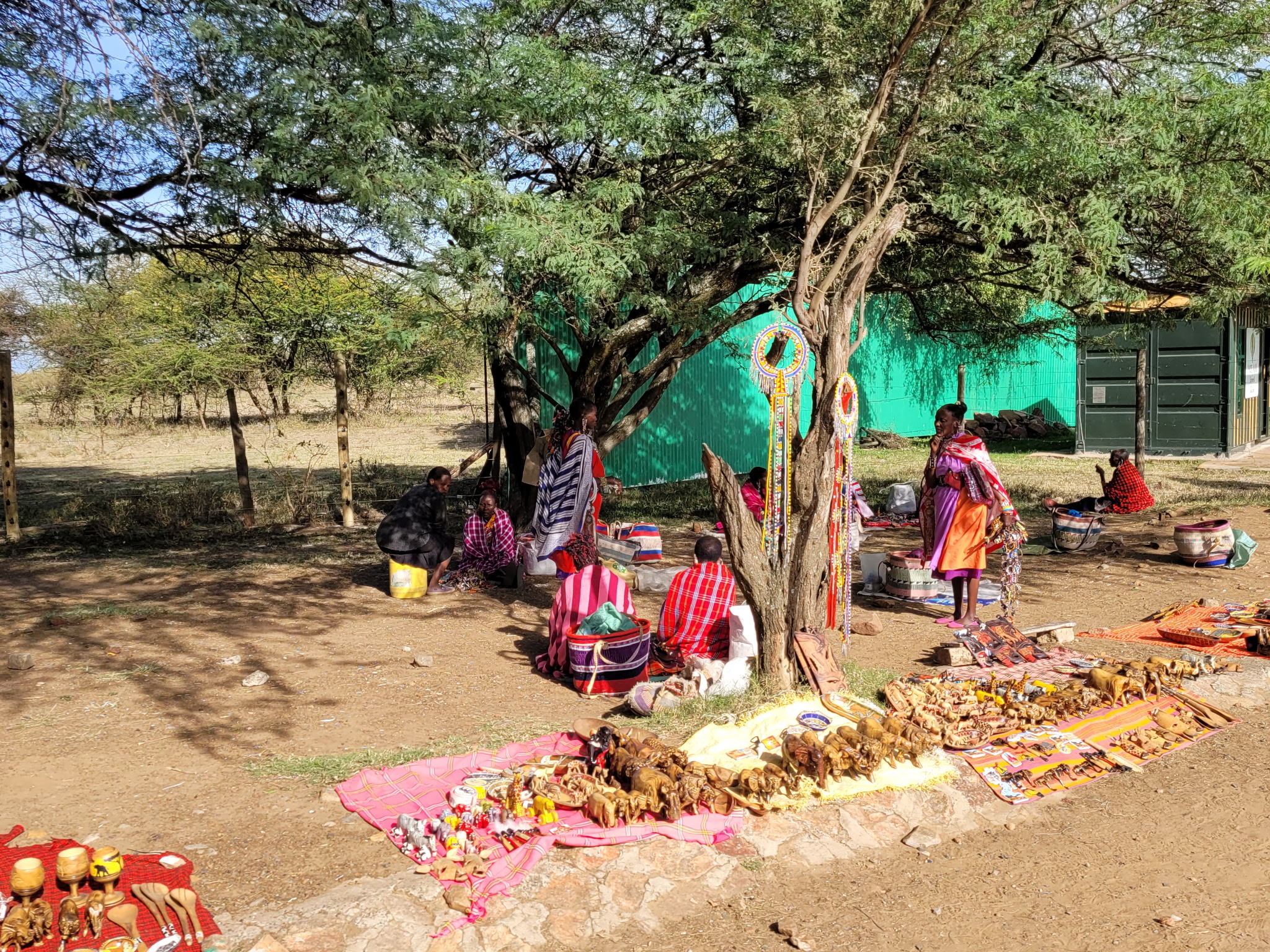Maasai women selling handmade crafts by the roadside