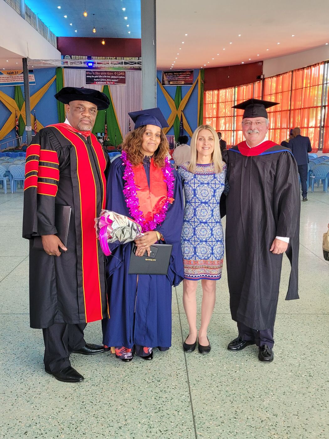 Mike and Tonya with a graduate and faculty member