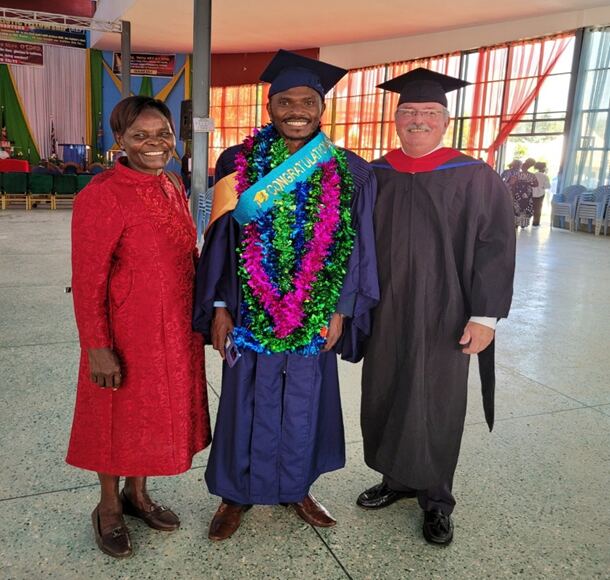 Pastor Allan Kiptangus with his mother and Professor Mike