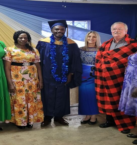 Pastor Allan Kiptangus's family with Mike and Tonya, who are wearing African wraps given as a gift